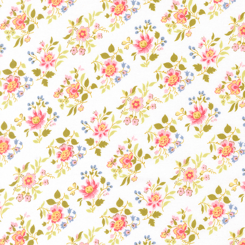 A white fabric with pink and blue floral clusters.