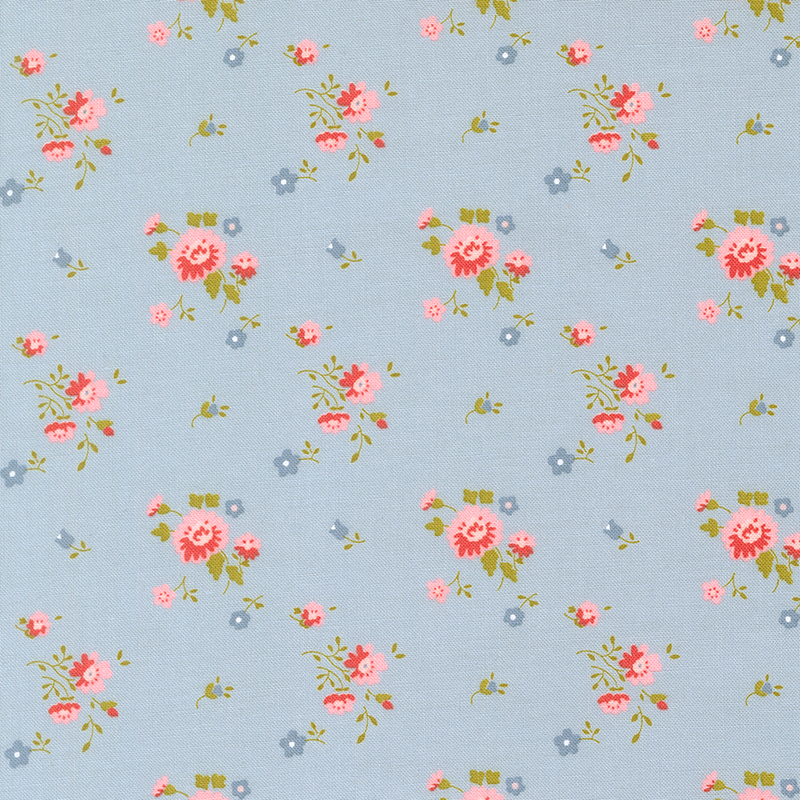 A soft blue fabric with pink and blue floral sprigs.