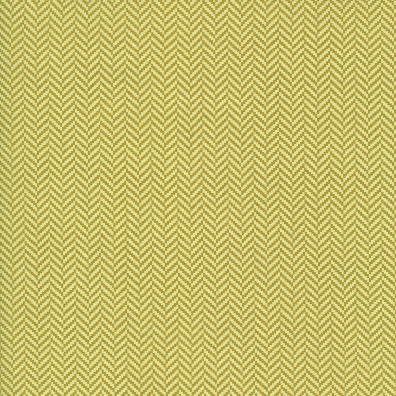 A green fabric featuring a small herringbone pattern.