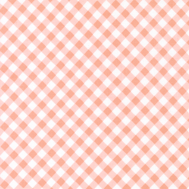 A light coral pink fabric featuring a diagonal gingham pattern.