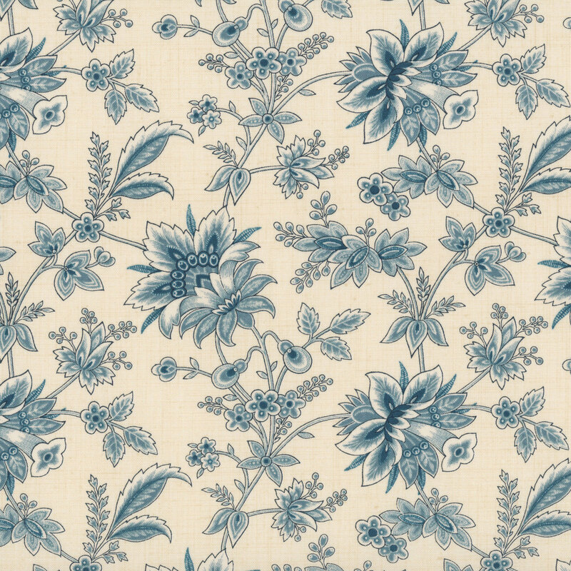 Cream fabric with dark teal sprigs, leaves, and florals.