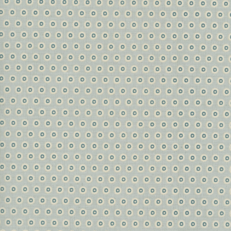 Misty aqua fabric with a staggered grid of floral teal dots.