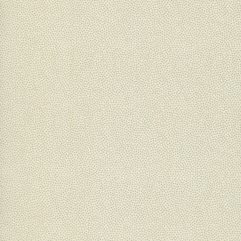 Cream fabric with small, packed cadet teal dots.