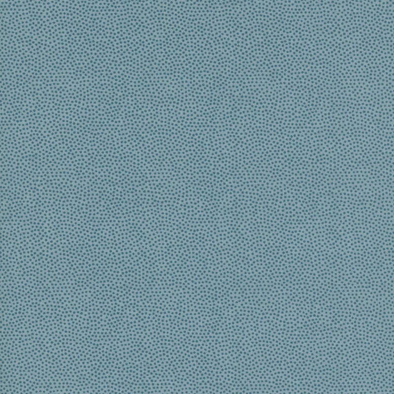Teal fabric with small, packed dark teal dots.