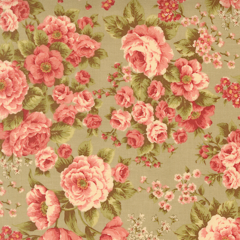 Green fabric with an elegant pattern of large, stylized florals.