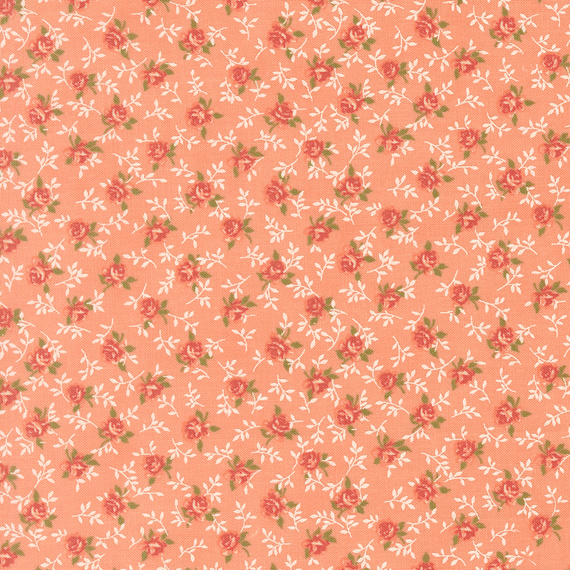 Salmon fabric with a charming tossed pattern of graceful roses and winding vines.