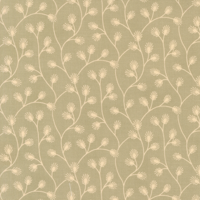 Light green fabric with a delicate pattern of tonal vines adorned with stylized leaves. 