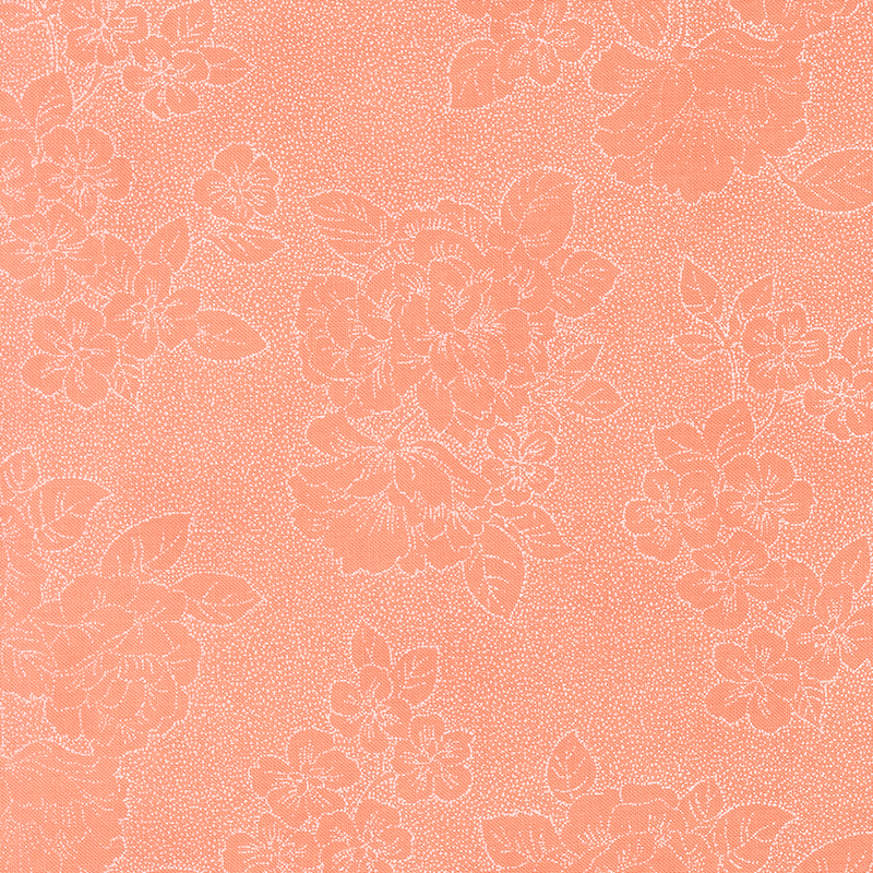 Salmon fabric with a stylized floral pattern composed of delicate speckled dots.