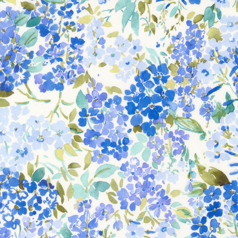packed pattern of lapis, periwinkle, and iris blue florals with green and teal hued leaves on a white background.