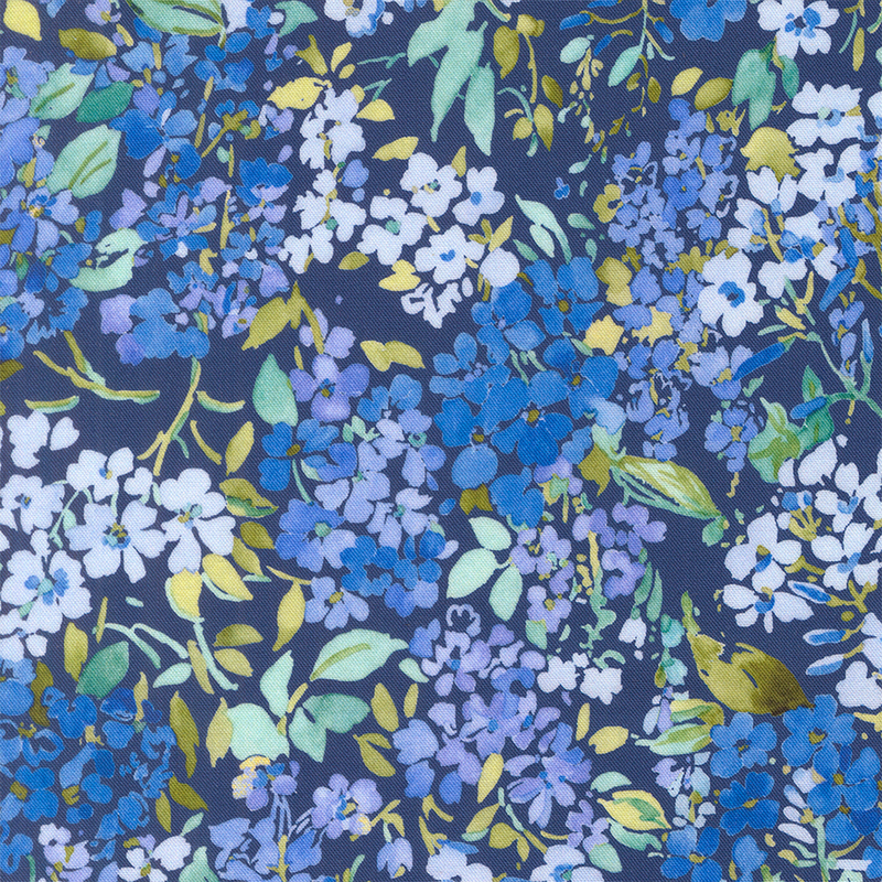packed pattern of lapis, periwinkle, and iris blue florals with green and teal hued leaves on a navy background.