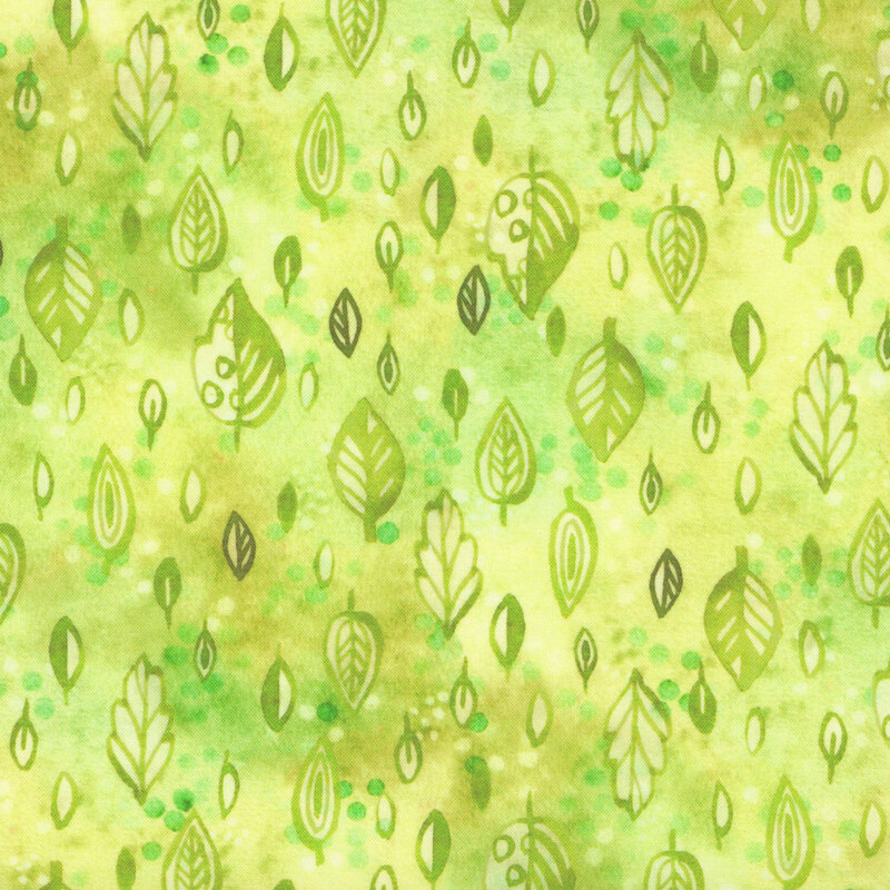 mottled lime green fabric with stylized watercolor leaves scattered throughout.