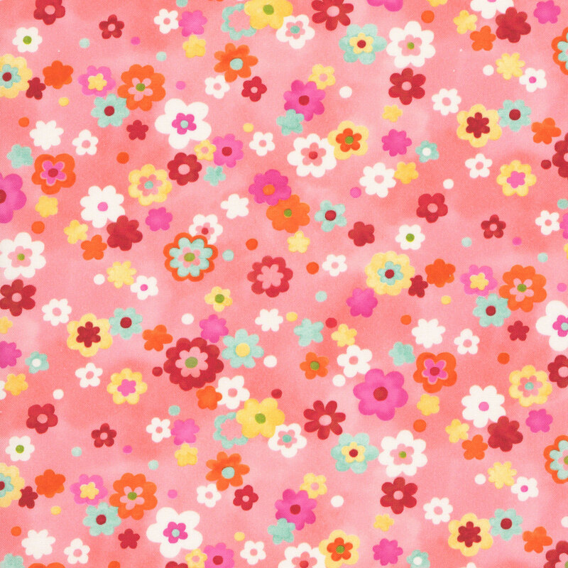 mint, yellow, pink, orange, and red florals and dots scattered on a mottled salmon pink background