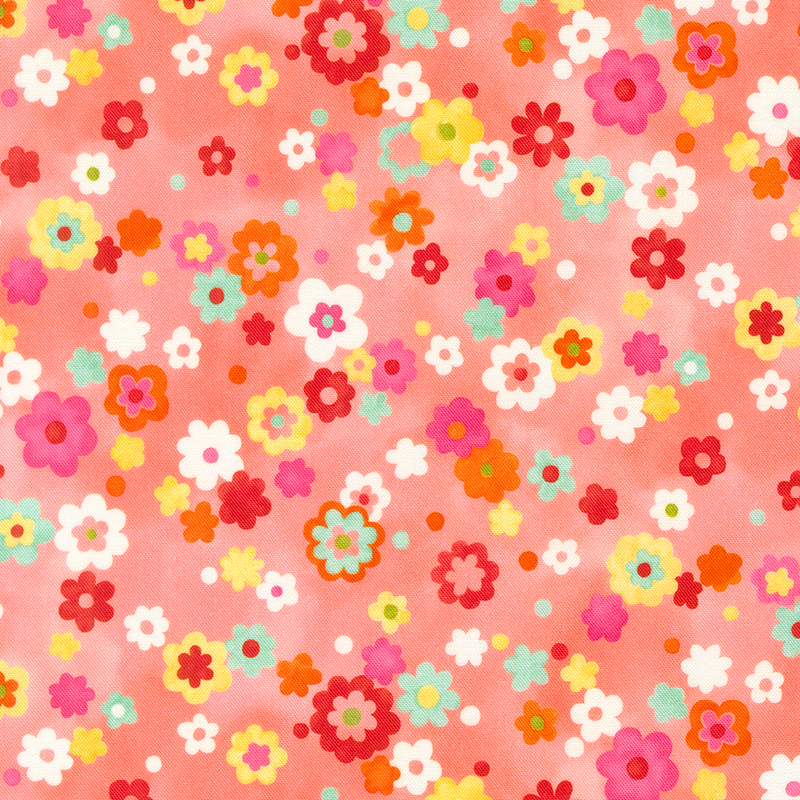 mint, yellow, pink, orange, and red florals and dots scattered on a mottled salmon pink background