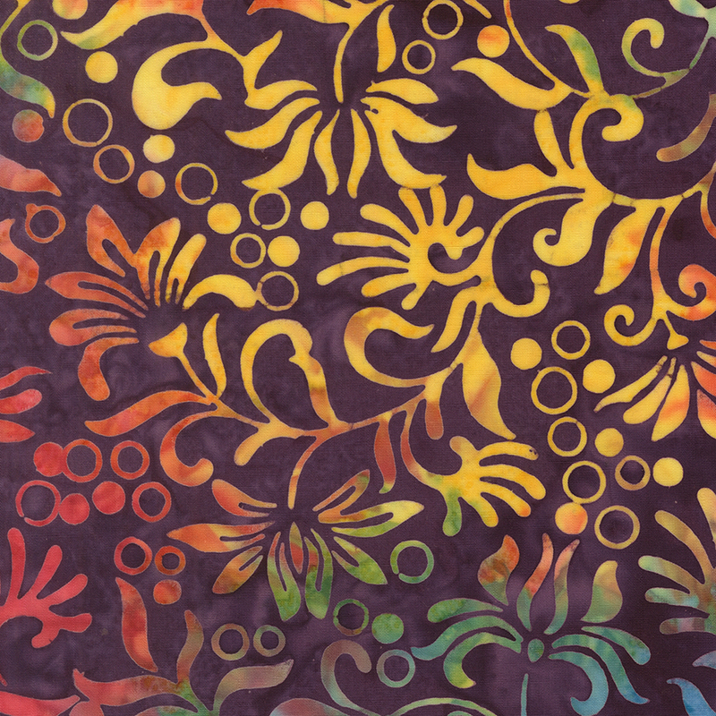 Dark mulberry purple batik topped with bright, multicolored floral and circular motifs.