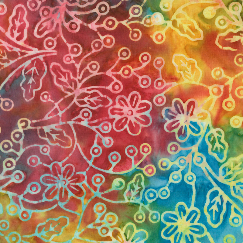 Rainbow batik topped with multicolor design of floral vines.