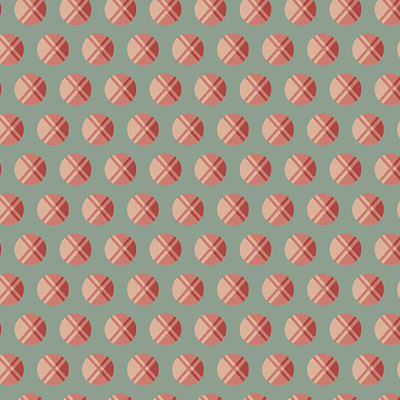 Teal fabric with a pattern of large sienna dots with plaid designs.