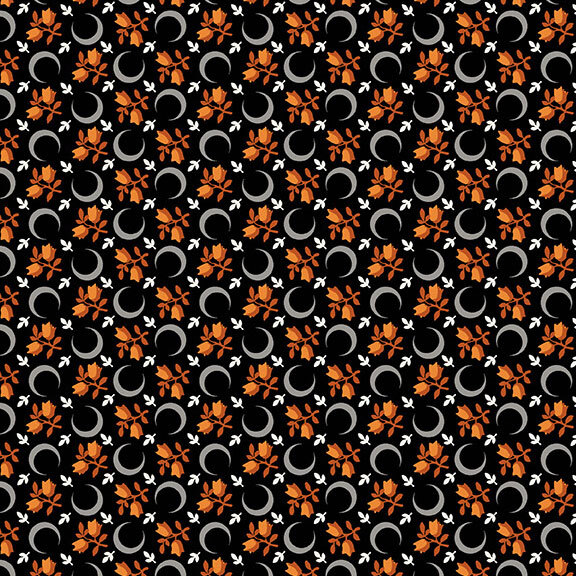 A black fabric with scattered crescent moons, floral sprigs, and leaves. 