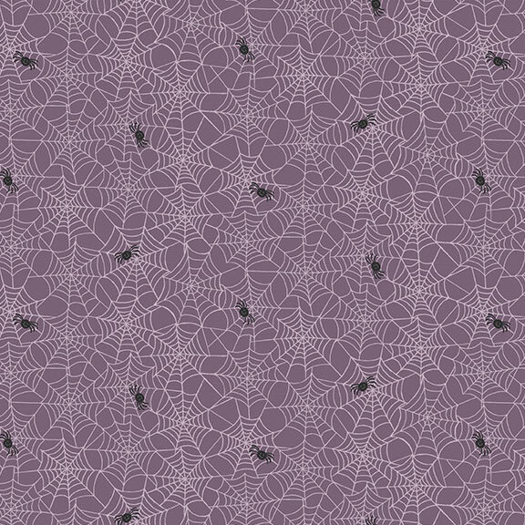 Dusty purple fabric featuring interconnected spiderwebs with scattered black spiders.