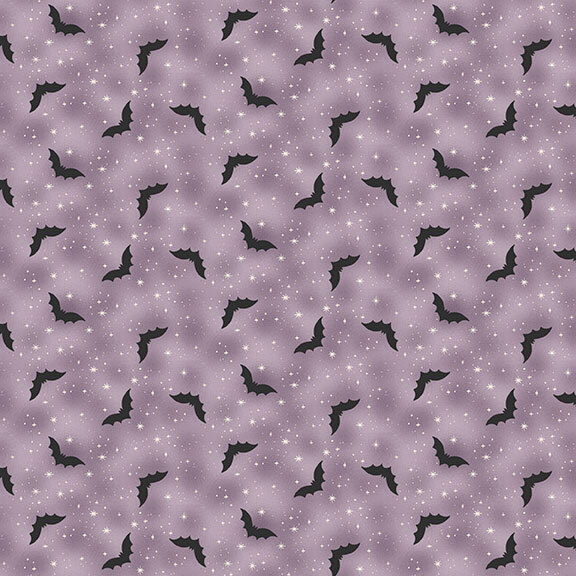 mottled dusty lilac fabric decorated with white stars and black bats.