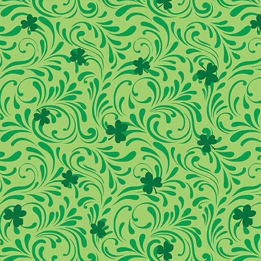 Fabric with a green shamrock and swirl pattern on a grass green background.