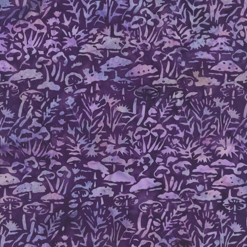 tonal purple batik fabric featuring mushrooms and leafy plants.