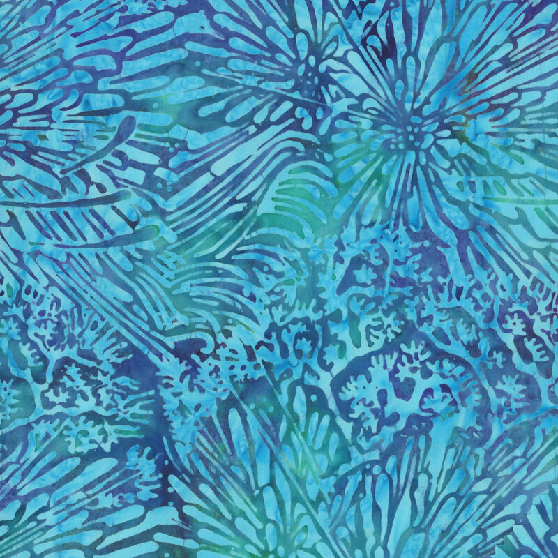 A mottled ocean blue fabric featuring layered coral and seaweed motifs.