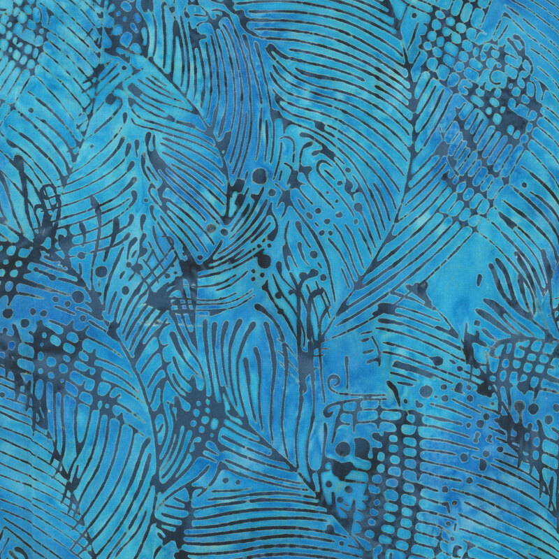 A mottled cerulean batik fabric featuring layered seaweed fronds and bubble-like details.