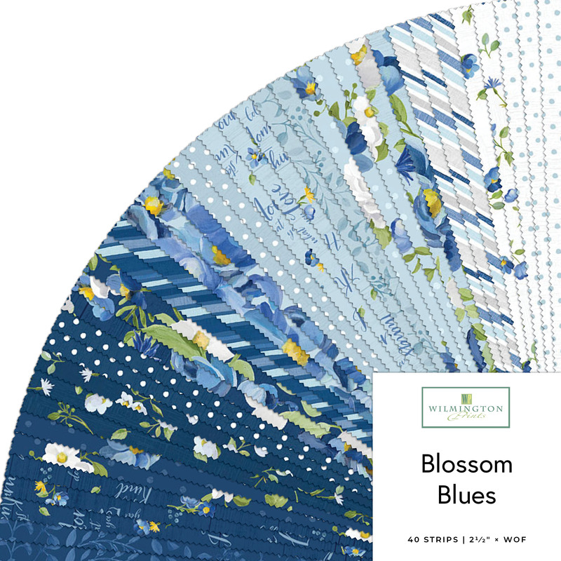 Fanned collage of fabrics from the blossom blue collection featuring floral, polka dot, striped, and worded prints in hues of blue and white.