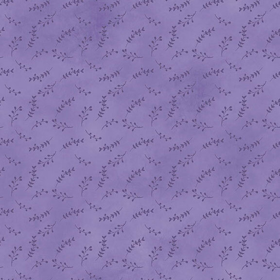 mottled heather purple fabric featuring a tonal print of tossed leaf sprigs