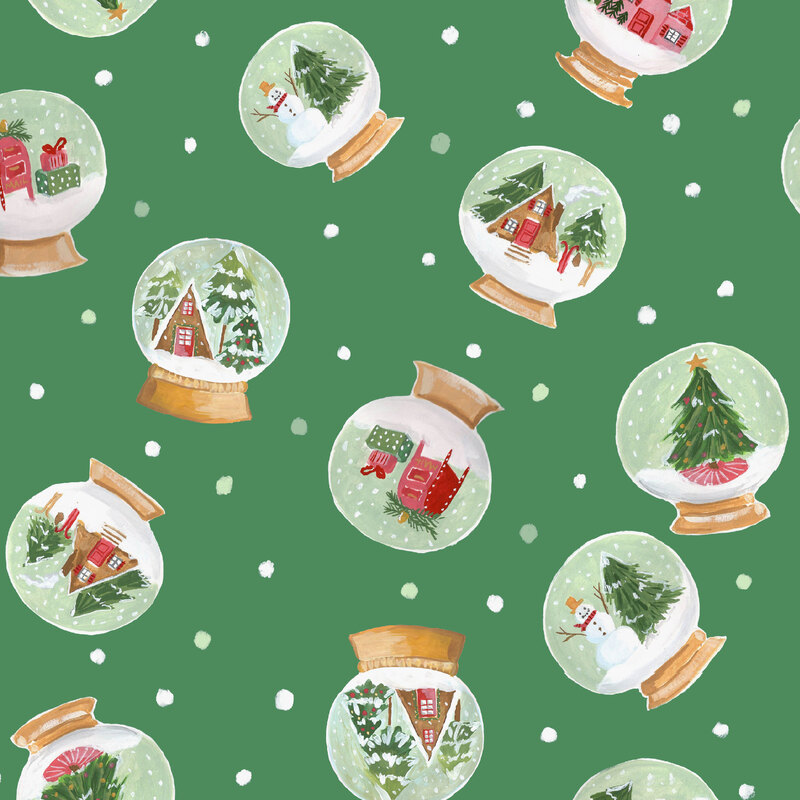 Green fabric with tossed watercolor snowglobes with cabins and trees inside.