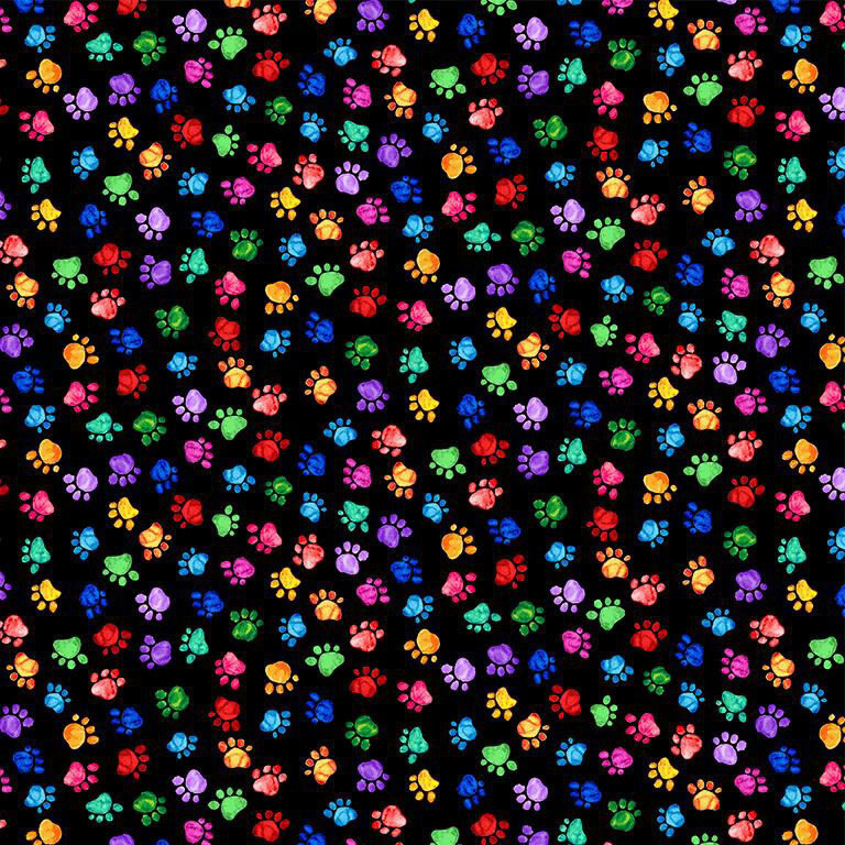 Black fabric with a tossed design of bright, multicolored paw prints.