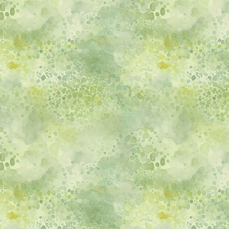 Mottled fabric with sage and olive green watercolor dots.