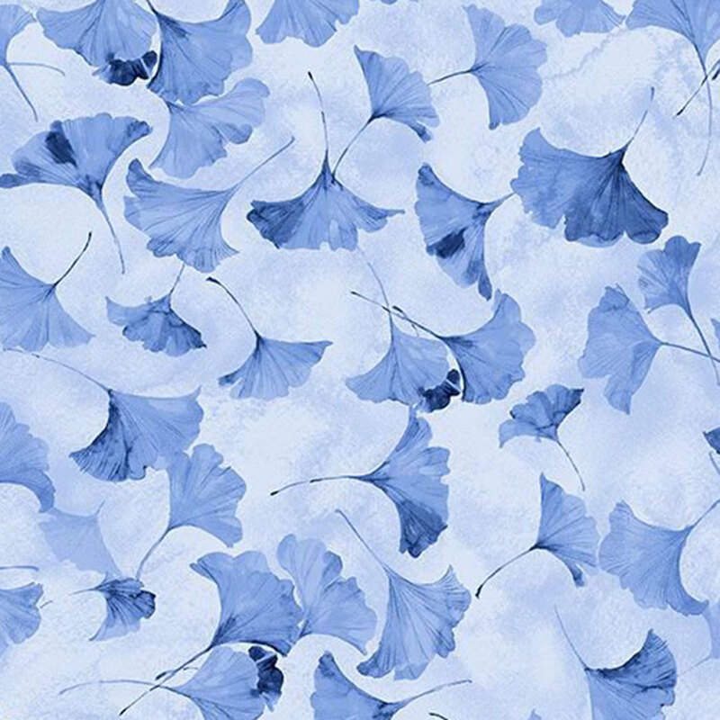 Mottled blue fabric with a tossed pattern of delicate ginkgo leaves.