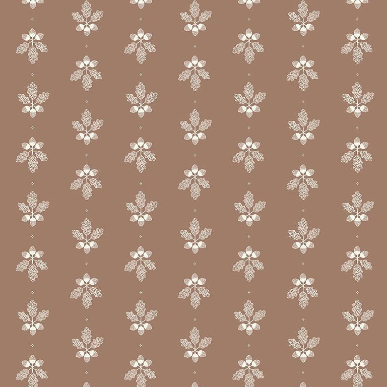 Sepia colored fabric with a staggered grid of white leafy sprigs with nutshells.