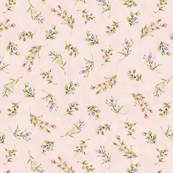 This light pink fabric features tossed sprigs and loose floral bouquets. 