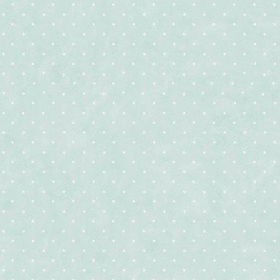 This mottled cottage blue fabric features tiny white polka dots. 