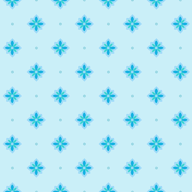 Aqua and blue floral motifs accented by geometric dots on a bleached denim background.