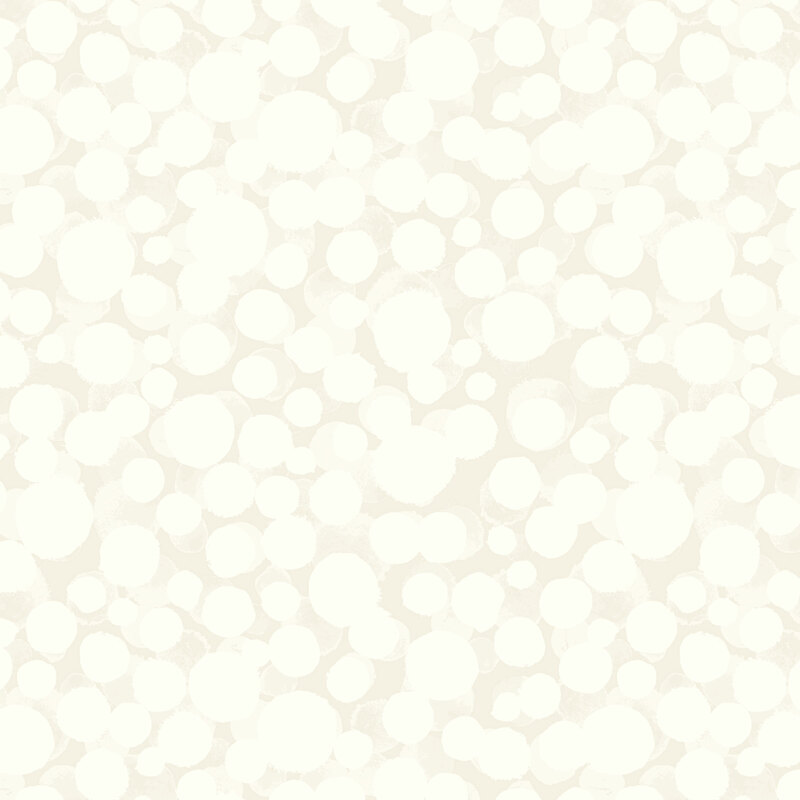 A cream glow in the dark fabric with scattered dots.