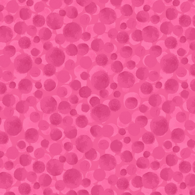 a hot pink fabric withs scattered dots.