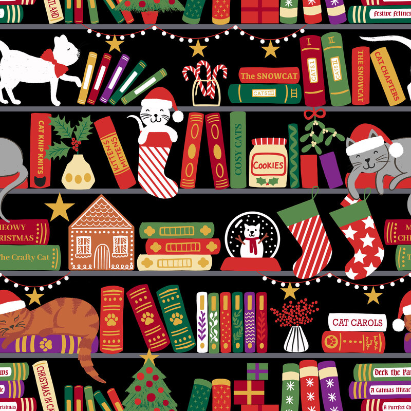 A black fabric with a festive Christmas bookshelf scene with cats. 