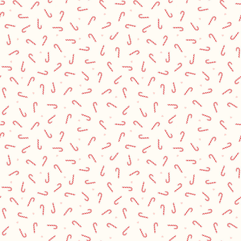 A cream fabric with tossed red and white candy canes with tiny pink hearts.