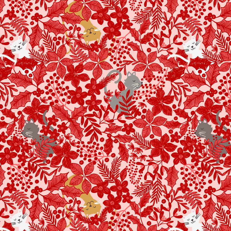 A pastel pink fabric with cats nestled in dense red Christmas foliage.