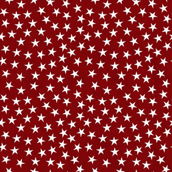 dark red fabric featuring a tossed pattern of white stars.