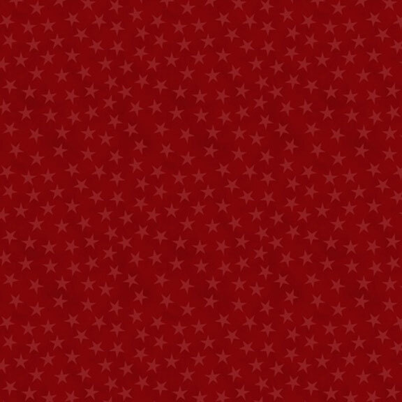 mottled red fabric with tonal stars