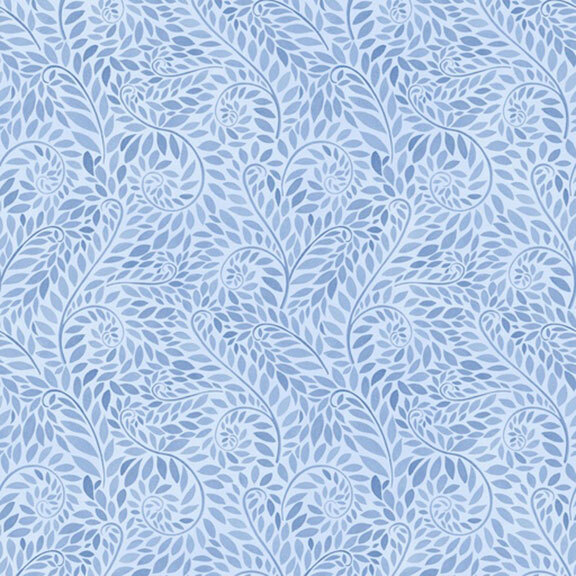 swirling leaf and vine print in tonal blue shades on a powder blue fabric.