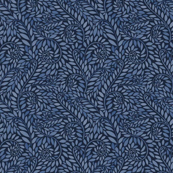 swirling leaf and vine print in tonal blue shades on a dark indigo fabric.