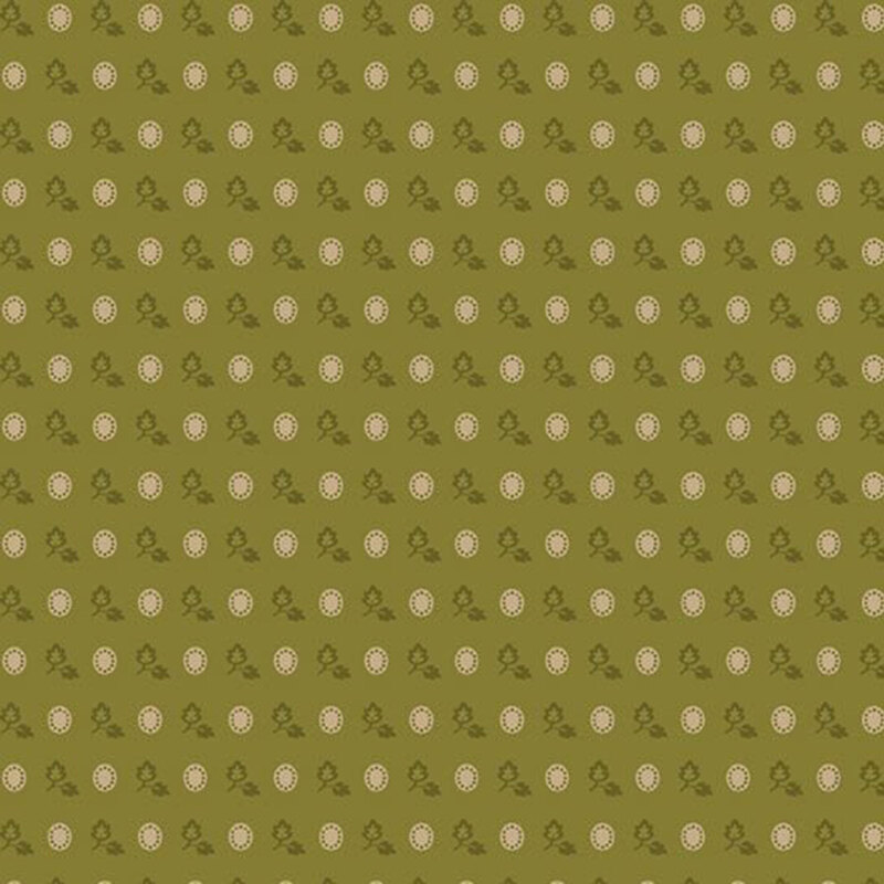 Olive green fabric with a staggered grid of light tan ovals and dark green leaves.