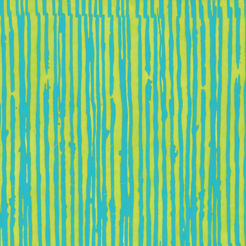 A lime green batik fabric featuring irregular aqua vertical stripes.