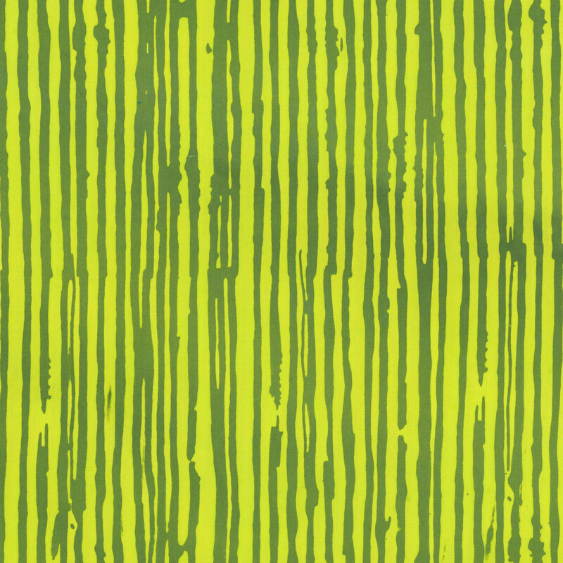 A highlighter green batik fabric featuring irregular olive green vertical stripes.