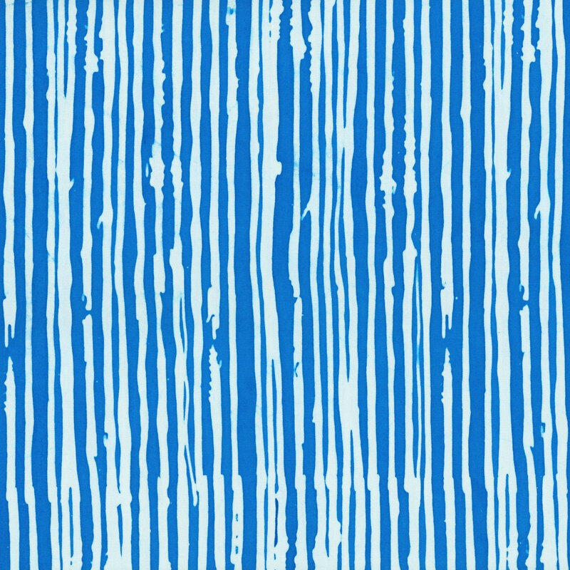 An azure blue batik featuring irregular vertical stripes.